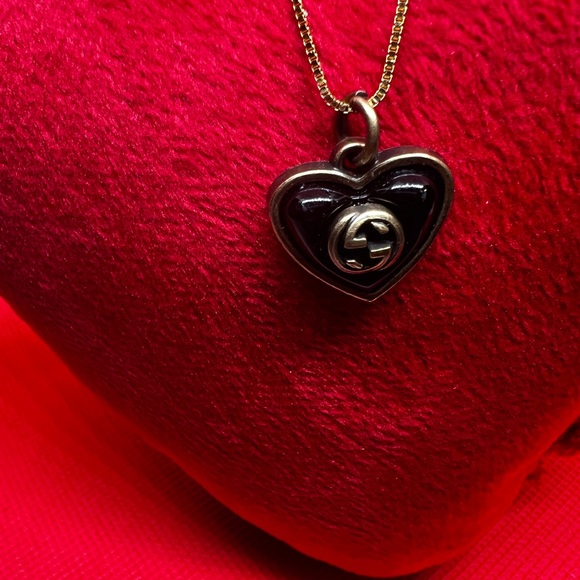 Authentic Gucci Heart Black and Gold Charm